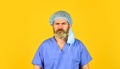 Protect people from virus. Beginning of virus outbreak. Man bearded doctor uniform yellow background. Type of virus