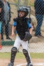 Protecting home plate during the game.