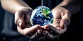 Protecting Our Planet: Sustainable Earth Preservation in Your Hands. Persons hands hold little Earth in shape of water drop Royalty Free Stock Photo