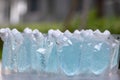 Protection against coronavirus: several bottle soaps and a green natural background. and A large amount of blue gel alcohol. for Royalty Free Stock Photo