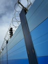 Protection fence with barbed wire for surface subway protection Royalty Free Stock Photo