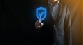 Protection network security computer in the hands of a businessman. business, technology, cyber security and internet concept - Royalty Free Stock Photo