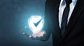 Protection network security computer and safe your data concept, Businessman holding shield protect icon Royalty Free Stock Photo