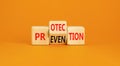 Protection and prevention symbol. Concept word Protection Prevention on wooden cubes. Beautiful orange table orange background. Royalty Free Stock Photo