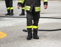 Protective boots of a firefighter after switching off the fire Royalty Free Stock Photo