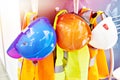 Protective construction workers helmets and vests Royalty Free Stock Photo