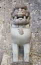 Protective deity Shisa lion sculpture on the front of the Kankaimon gate of Shuri Castle in the Shuri neighborhood of Naha, the