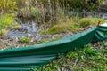 Protective fence for frogs at a pond