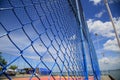 Protective fence on sports court Royalty Free Stock Photo