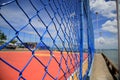 Protective fence on sports court Royalty Free Stock Photo