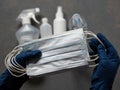 Protective gear to prevent viral infection, such as hand sanitizer, surgical mask, and rubber protective gloves Royalty Free Stock Photo