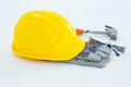 Protective gloves with hammer, glasses and yellow hard hat Royalty Free Stock Photo