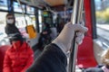 Protective gloves in public transport in Prague - coronavirus protection