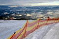 Protective grid on the ski slope in the winter mountains Royalty Free Stock Photo