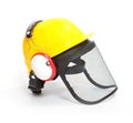 Protective helmet, earmuffs and face shield.