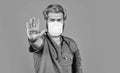 Protective mask. Open palm stop gesture. Danger zone. Stop epidemic. Virus concept. Epidemic infection. Critical number Royalty Free Stock Photo