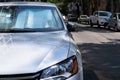 Protective reflective surface under windshield of car on hot day, heated by sun's rays inside car