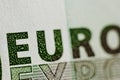 Protective watermark on a hundred euro bill in macro. protection against counterfeiting of banknotes. hologram. detail of paper Royalty Free Stock Photo