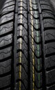 Protector of automobile tires. Close up view on auto mobile new wheel tire surface. Car constraction industry commercial Royalty Free Stock Photo