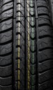 Protector of automobile tires. Close up view on auto mobile new wheel tire surface. Car constraction industry commercial Royalty Free Stock Photo