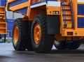 The protector of a large rubber wheel. Huge rubber tire career dump trucks, mining trucks from the tipper Royalty Free Stock Photo