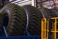 The protector of a large rubber wheel. Huge rubber tire career dump trucks, mining trucks from the tipper. Royalty Free Stock Photo