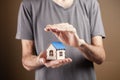 protects the house with his hands Royalty Free Stock Photo