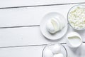 Proteic breakfast concept with dairy products on table top view