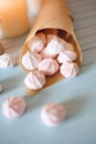 Protein based dessert. White and pink marshmallows in paper cone Royalty Free Stock Photo