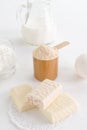 Protein products such as whey powder, snack bar and egg with milk and curd, selective focus Royalty Free Stock Photo