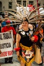 Protest against Immigration ICE and Border Patrol. A Mexican woman dressed in native Aztec costume and headdress Royalty Free Stock Photo