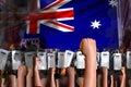 Protest in Australia - police special forces stand against the protestors crowd on flag background, disorder fighting concept,