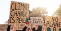 Protest, climate change and poster with a group of people outdoor at a rally or march for conservation. Global warming Royalty Free Stock Photo