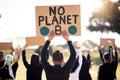 Protest, climate change and sign with a group of people outdoor at a rally or march for conservation. Global warming Royalty Free Stock Photo