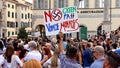 Protest demonstration and sign against the European green pass, or EU Covid certificate