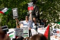 Protest messages on placards and posters at the Gaza: Stop The Massacre rally in Whitehall, London, UK.