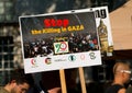 Protest messages on placards and posters at the Gaza: Stop The Massacre rally in Whitehall, London, UK.