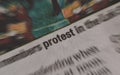 Protest News headline in newspaper