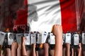 Demonstration fighting concept - protest in Peru on flag background, police officers stand against the demonstrators crowd -