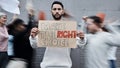 Protest poster, man and portrait with fight, human rights support and rally sign in city. Urban, group and protesting