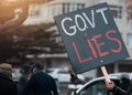 Protest, poster and people in street for government corruption, crime and money laundering with activism. Crowd, board Royalty Free Stock Photo