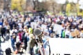 Protest, public demonstration, human rights or pension reform strike, focus on microphone, blurred crowd of citizens with flags Royalty Free Stock Photo