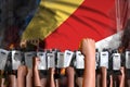 Protest in Seychelles - police special forces stand against the angry crowd on flag background, demonstration stopping concept,