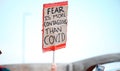 Protest, sign and covid or demonstration with board, slogan and beliefs for fight against political views on medical