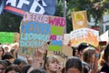 Protest sign saying `Earth is getting hotter than Leonardo DiCaprio` held up by young people during Fridays for Future