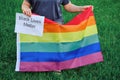 Protest in the United States, the LGBT flag and the text Black Lives Matter. Concept of anti-racism, protests and demonstrations