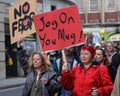 Protester Hold Signs at an Anti-Trump Rally