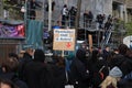 A protester holding a placecard saying `Revolution instead of e-cars` Royalty Free Stock Photo