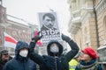 Protester holding poster on prostest against Russian agression. Helsinki, Finland, 7.02.2022