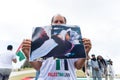 Protester holds a photo of the war in Palestine during a protest in the city of Salvador, Bahia